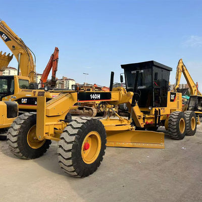 हाइड्रोलिक ड्राइविंग फॉर्म कैटरपिलर ग्रेडर 140h 14677kg मशीन वजन और सटीक सड़क ग्रेडिंग के लिए